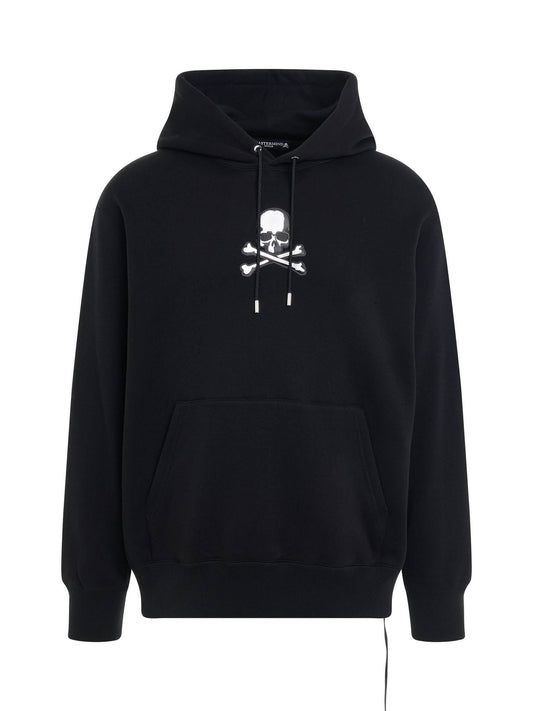 Image of a model wearing Outerwear. Productname: MASTERMIND Skull Emblem Hoodie in BLACK colour by brand - MASTERMIND