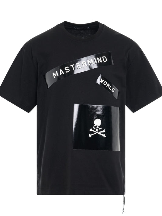 Image of a model wearing Tops. Productname: MASTERMIND Labelwriter T-Shirt in BLACK colour by brand - MASTERMIND