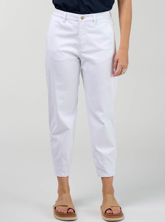 Image of a model wearing Pants. Product name - MADLY SWEETLY ESSENCE PANTS in White colour by brand - Madly Sweetly