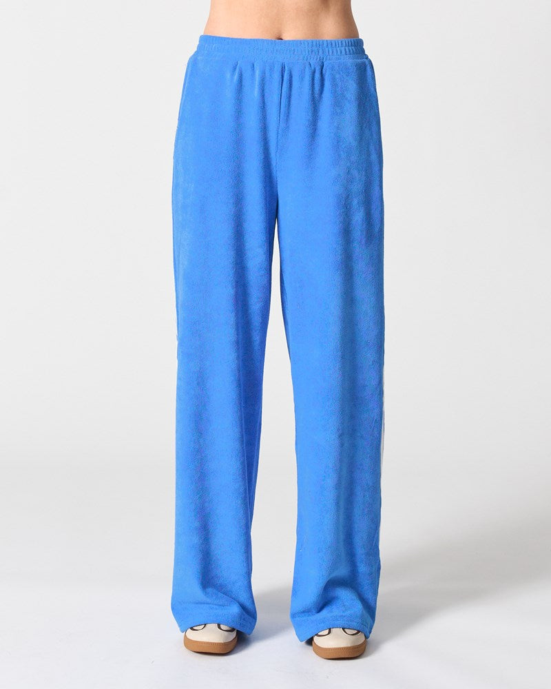 Image of a model wearing Pants. Product name - Madrid Pant in Blue colour by brand - Walnut Melbourne