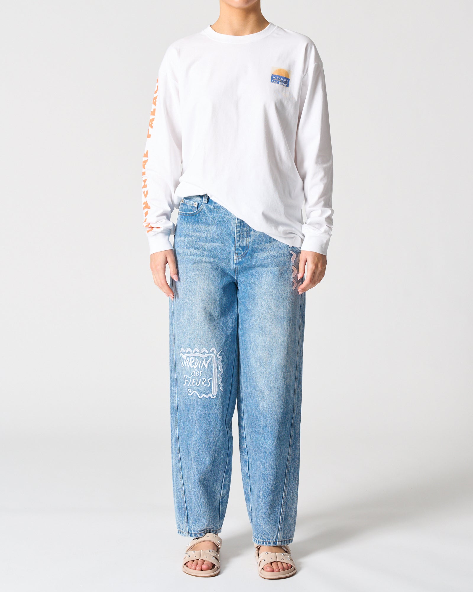Image of a model wearing Tops. Productname: Malibu Long Sleeve Tee in Miramare colour by brand - Walnut Melbourne