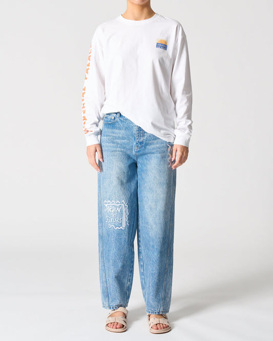 Image of a model wearing Tops. Productname: Malibu Long Sleeve Tee in Miramare colour by brand - Walnut Melbourne