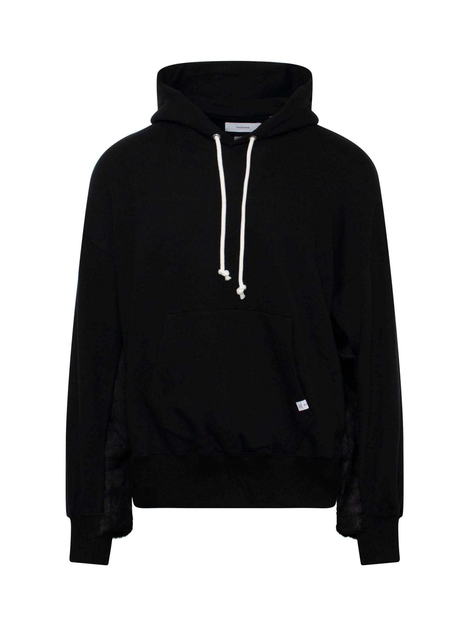 Image of a model wearing Outerwear. Productname: FACETASM Faux Fur Hoodie in BLACK colour by brand - FACETASM