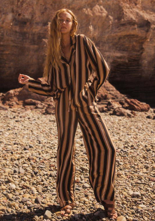 Image of a model wearing Pants. Productname: Auguste The Label Martha Pant in Tan/Brown colour by brand - Auguste The Label