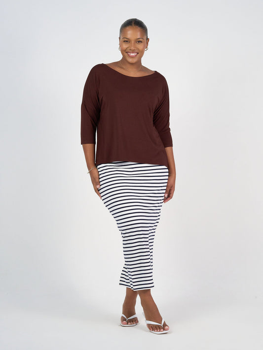 Image of a model wearing Skirts. Product name - Maxi Whitney Bamboo Tube Skirt Navy & White Stripe in Navy & White Stripe colour by brand - Lou Lou