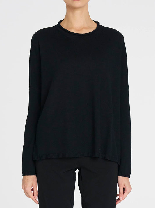 Image of a model wearing Outerwear. Productname: MELA PURDIE PANAMA SWEATER in Black colour by brand - Mela Purdie