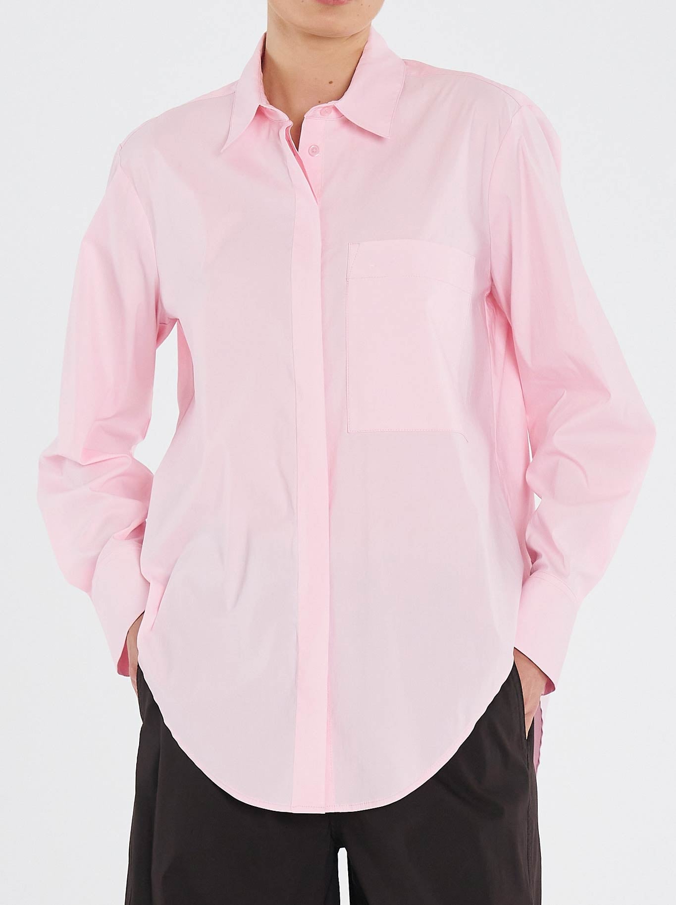 Image of a model wearing Tops. Product name - MELA PURDIE SAVILLE SHIRT in Rosebud colour by brand - Mela Purdie