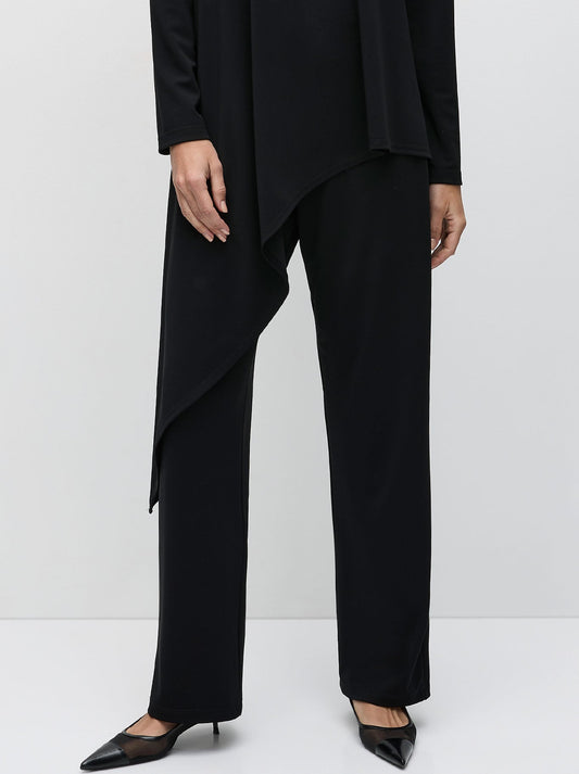 Image of a model wearing Pants. Productname: MELA PURDIE LONG PANT in Black colour by brand - Mela Purdie