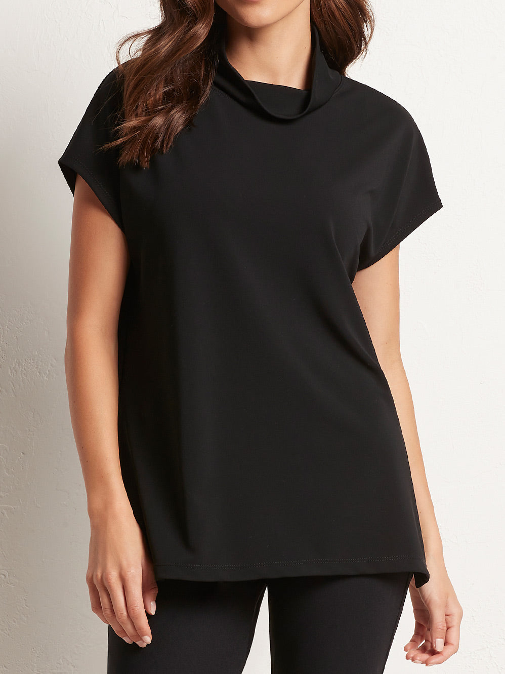 Image of a model wearing Tops. Productname: MELA PURDIE FUNNEL SHELL in Black colour by brand - Mela Purdie