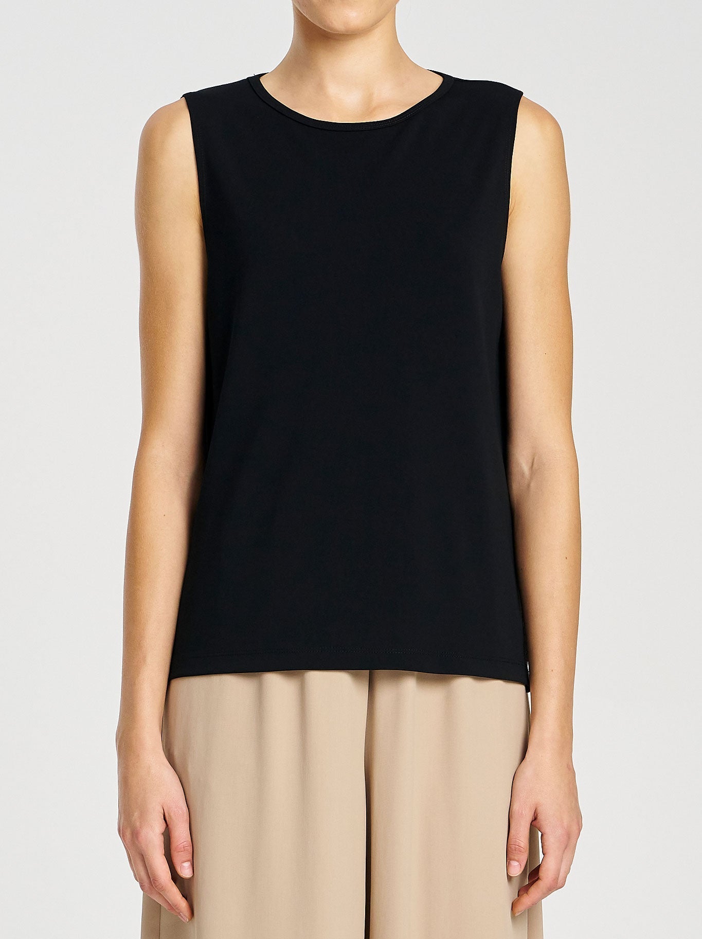 Image of a model wearing Tops. Productname: MELA PURDIE BOATER SHELL in Black colour by brand - Mela Purdie