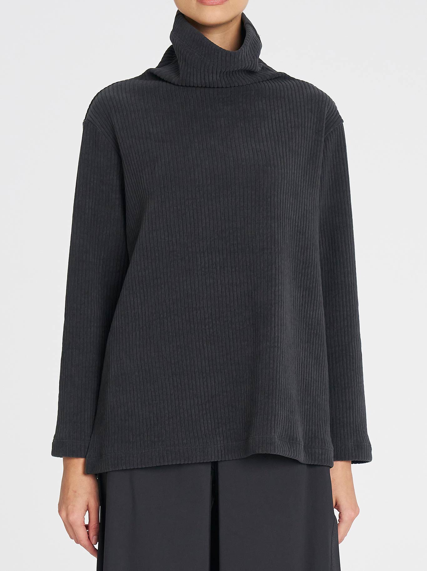 Image of a model wearing Outerwear. Productname: Mela Purdie Funnel Sweater in Phantom colour by brand - Mela Purdie