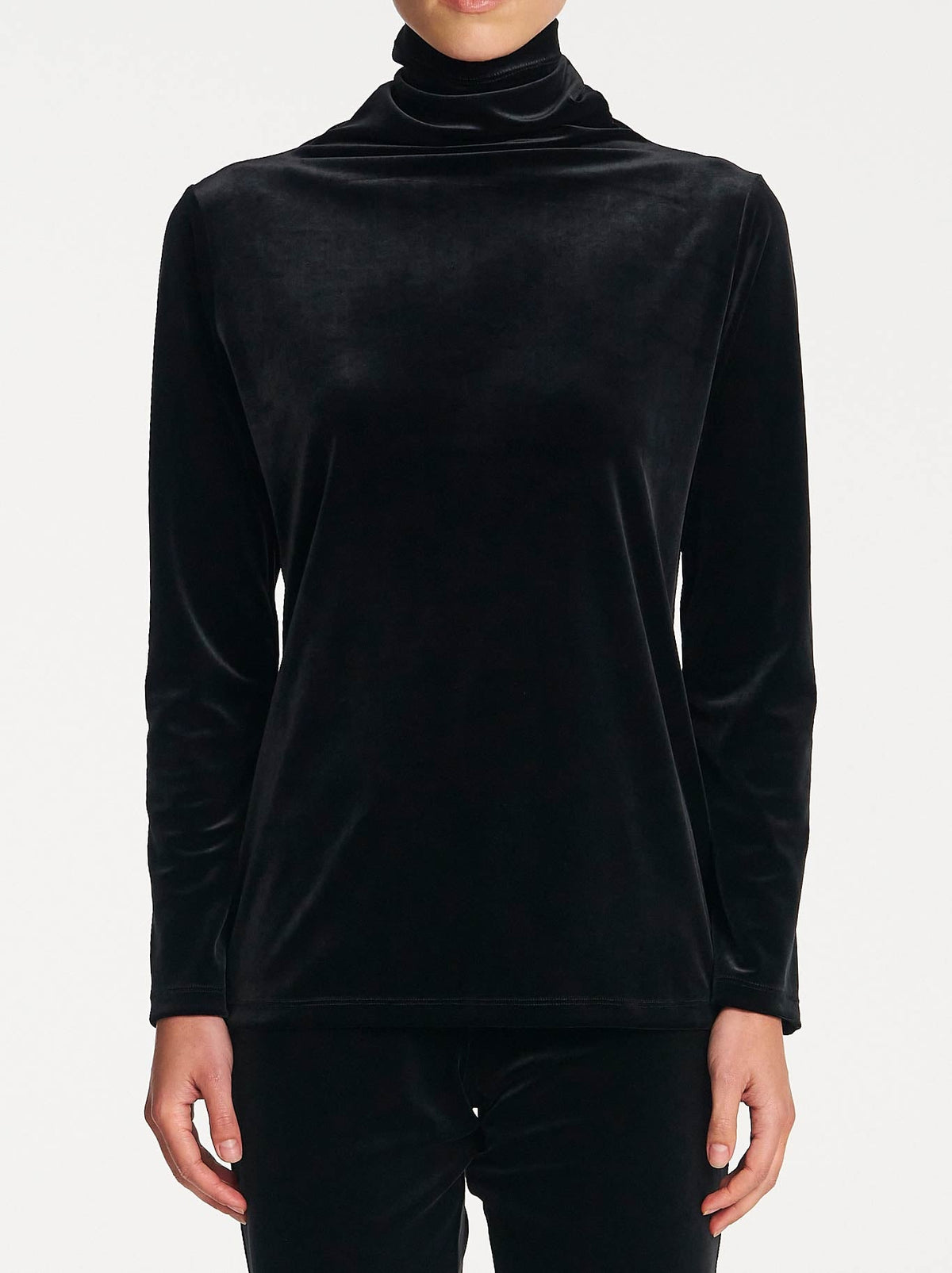 Image of a model wearing Tops. Product name - Mela Purdie Funnel Top in Black colour by brand - Mela Purdie