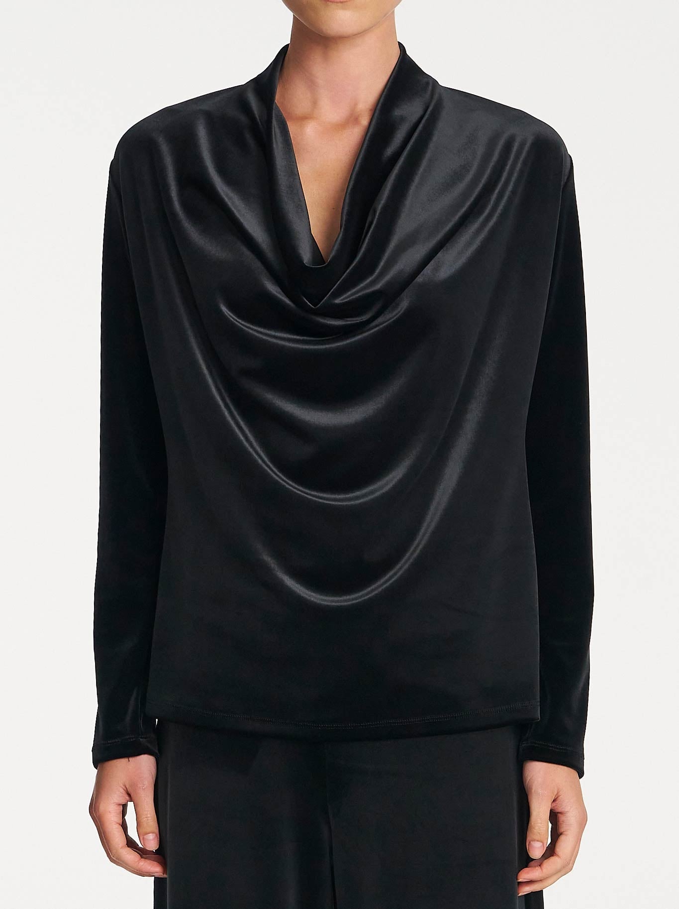 Image of a model wearing Tops. Product name - MELA PURDIE DRAPE TOP in Black colour by brand - Mela Purdie