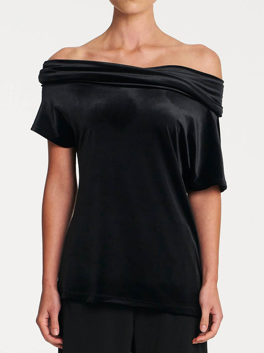 Image of a model wearing Tops. Product name - MELA PURDIE FRAME SHELL in Black colour by brand - Mela Purdie