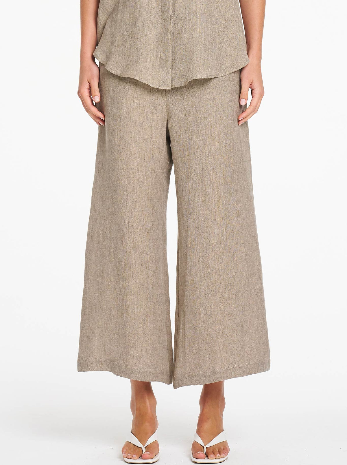 Image of a model wearing Pants. Product name - Mela Purdie Lino Pant in Stucco colour by brand - Mela Purdie