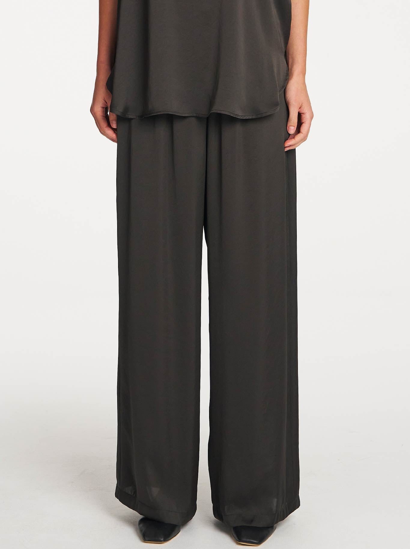 Image of a model wearing Pants. Product name - Mela Purdie Maxi Pace Pant in Mink colour by brand - Mela Purdie