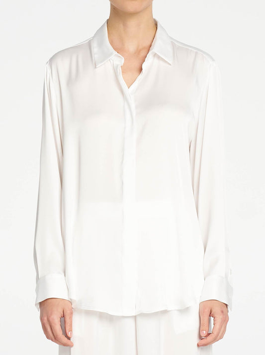 Image of a model wearing Tops. Product name - Mela Purdie Soft Shirt in White colour by brand - Mela Purdie