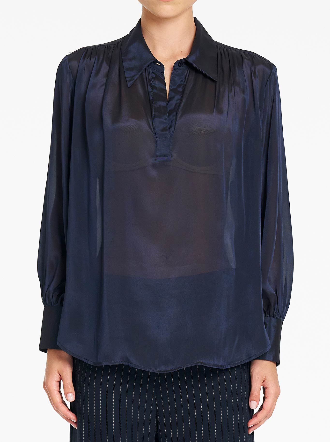 Image of a model wearing Tops. Product name - Mela Purdie Atrium Blouse in Galaxy colour by brand - Mela Purdie