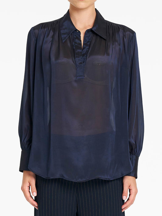Image of a model wearing Tops. Product name - Mela Purdie Atrium Blouse in Galaxy colour by brand - Mela Purdie