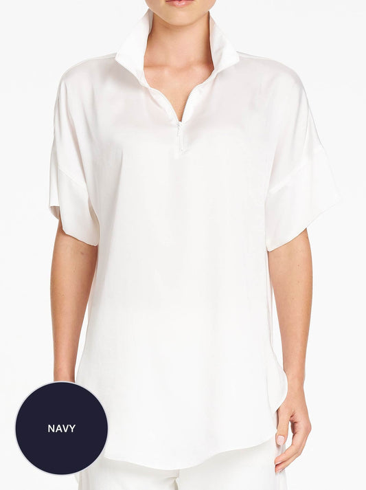 Image of a model wearing Tops. Product name - MELA PURDIE FUNNEL TUNIC in Navy colour by brand - Mela Purdie