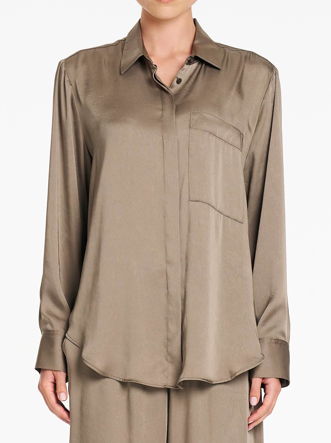 Image of a model wearing Tops. Product name - MELA PURDIE SAVILLE SHIRT in Twig colour by brand - Mela Purdie