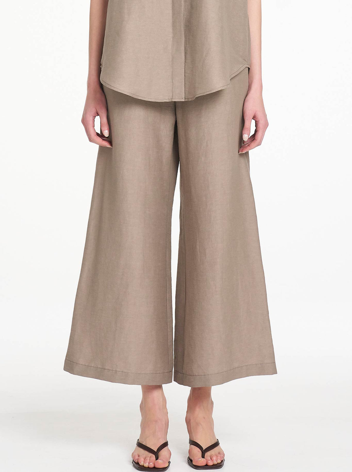 Image of a model wearing Pants. Product name - Mela Purdie Lino Pant in Twig colour by brand - Mela Purdie