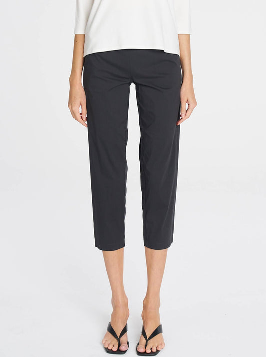 Image of a model wearing Pants. Product name - Mela Purdie Nomad Pant in Black colour by brand - Mela Purdie