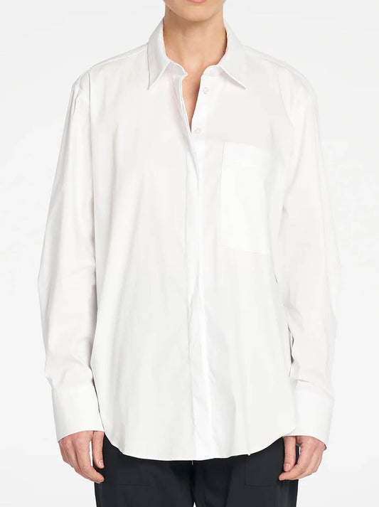 Image of a model wearing Tops. Product name - MELA PURDIE SAVILLE SHIRT in White colour by brand - Mela Purdie