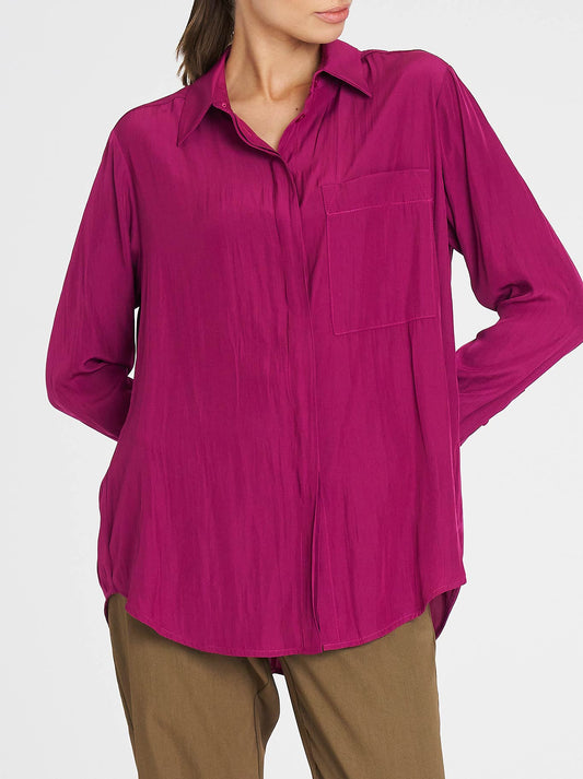 Image of a model wearing Tops. Product name - MELA PURDIE SINGLE POCKET SHIRT in Black colour by brand - Mela Purdie