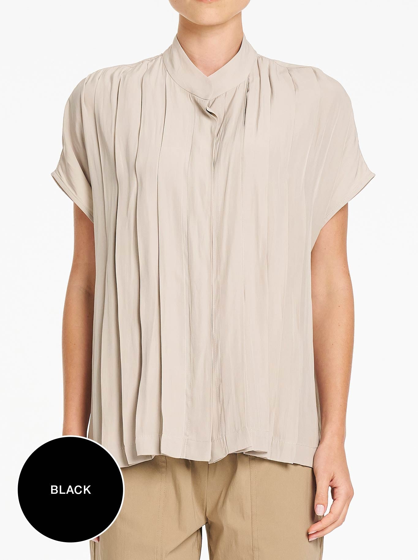 Image of a model wearing Tops. Product name - Mela Purdie Full Pleat Shell in Black colour by brand - Mela Purdie