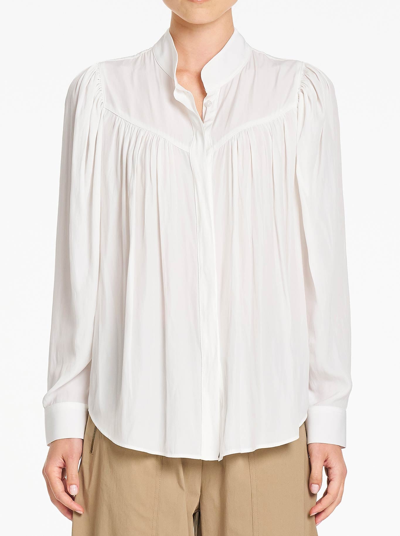 Image of a model wearing Tops. Product name - Mela Purdie Lyric Blouse in White colour by brand - Mela Purdie