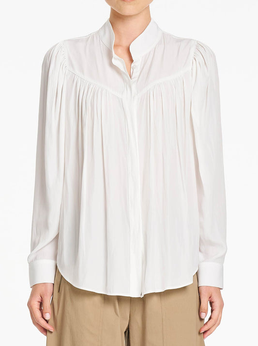 Image of a model wearing Tops. Product name - Mela Purdie Lyric Blouse in White colour by brand - Mela Purdie