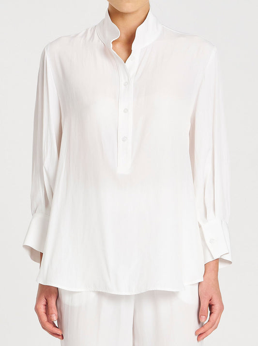 Image of a model wearing Tops. Product name - Mela Purdie Resort Shirt in White colour by brand - Mela Purdie