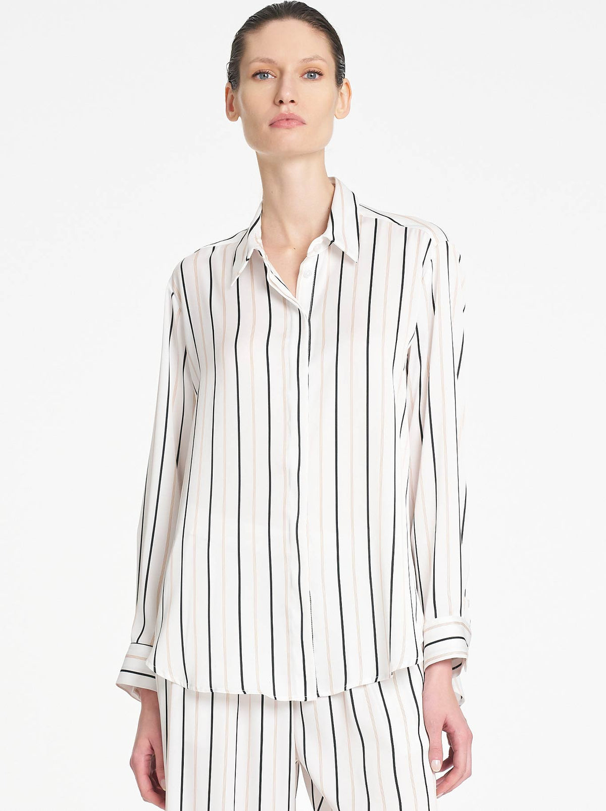 Image of a model wearing Tops. Product name - Mela Purdie Soft Shirt in White/Black colour by brand - Mela Purdie