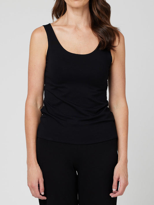 Image of a model wearing Tops. Productname: MELA PURDIE SINGLET in Black colour by brand - Mela Purdie