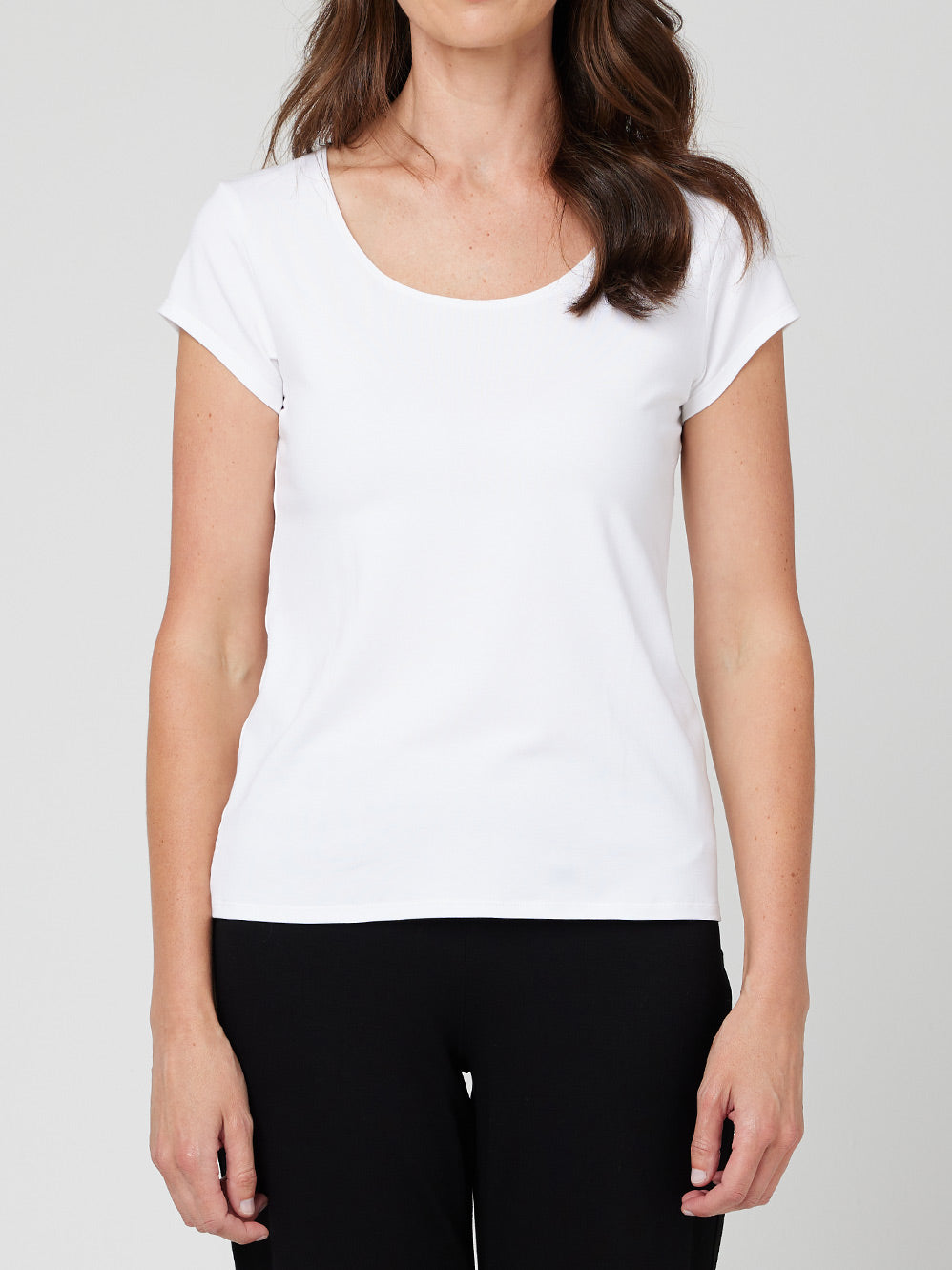 Image of a model wearing Tops. Productname: MELA PURDIE SCOOP NECK T in White colour by brand - Mela Purdie