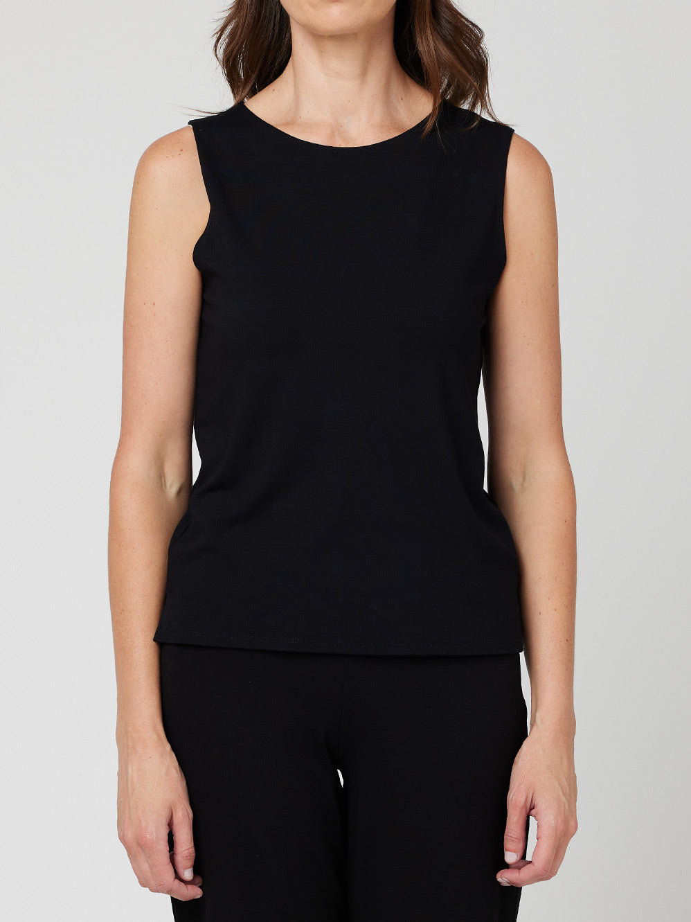 Image of a model wearing Tops. Productname: MELA PURDIE PALAZZO SHELL TANK in Black colour by brand - Mela Purdie