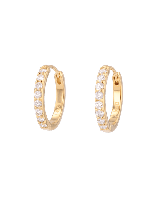 Image of Earrings. Product name - Miami Gold Diamond Huggie Earrings in colour by brand - LAVANA