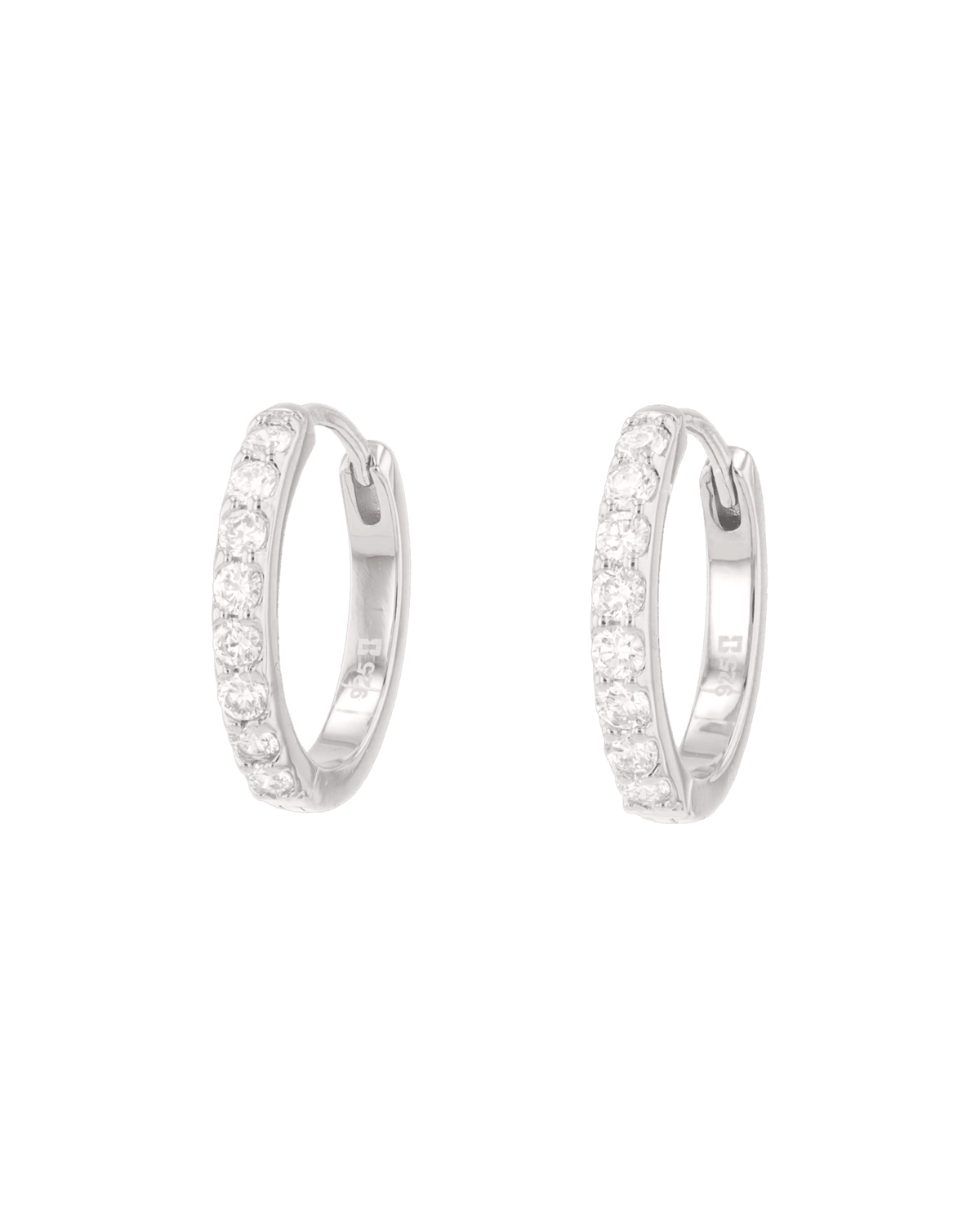 Image of Earrings. Product name - Miami Silver Diamond Huggie Earrings in colour by brand - LAVANA