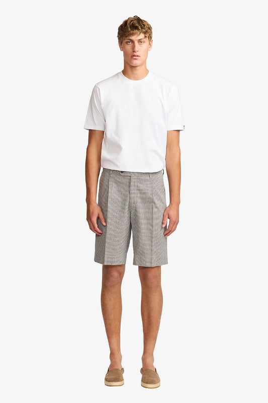 Image of a model wearing Shorts. Product name - Modena linen shorts in Shorts colour by brand - Anthony Squires