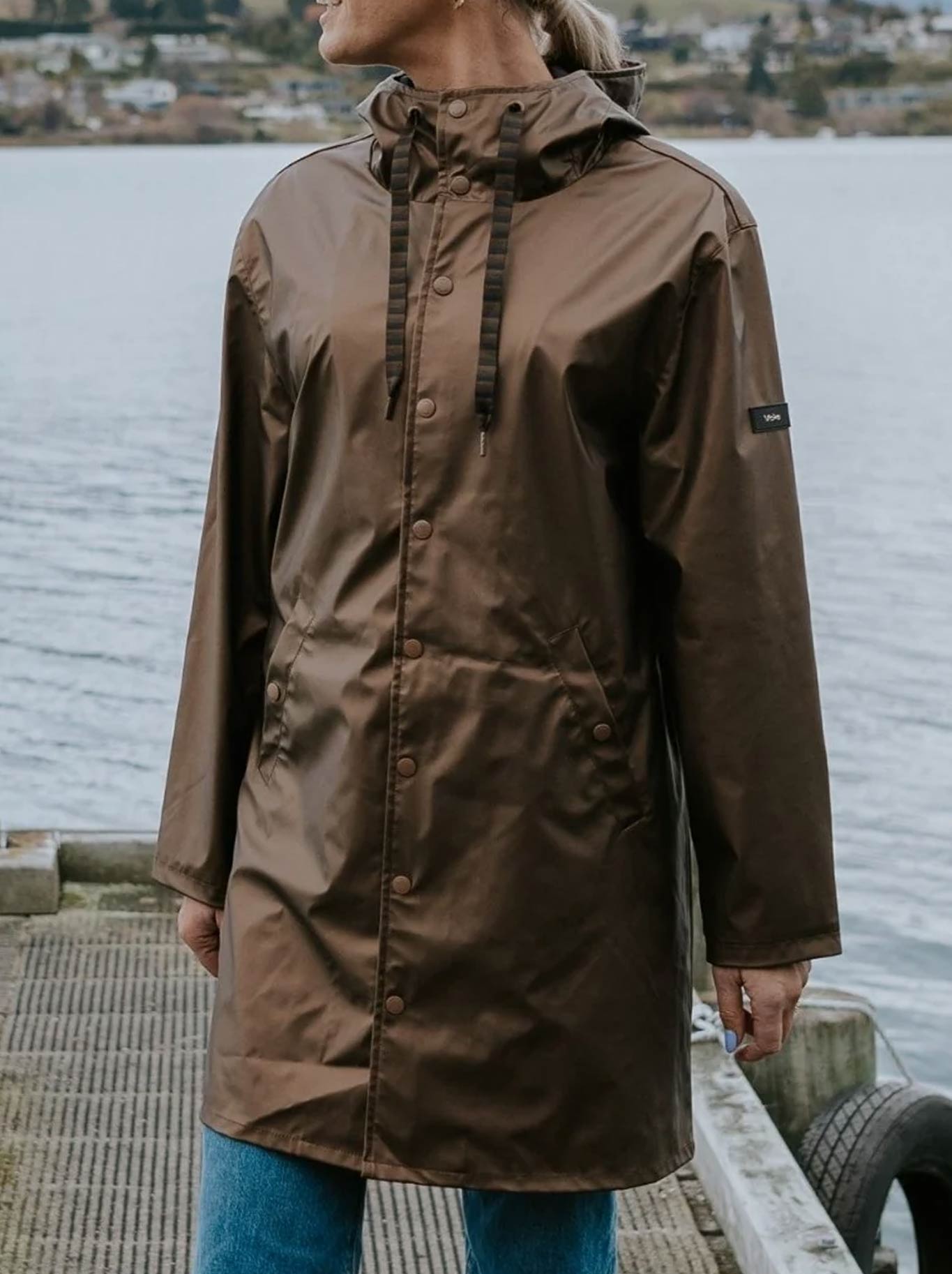 Image of a model wearing Rain Coats. Productname: Moke Charlie Rain Coat in Antique Gold colour by brand - Moke