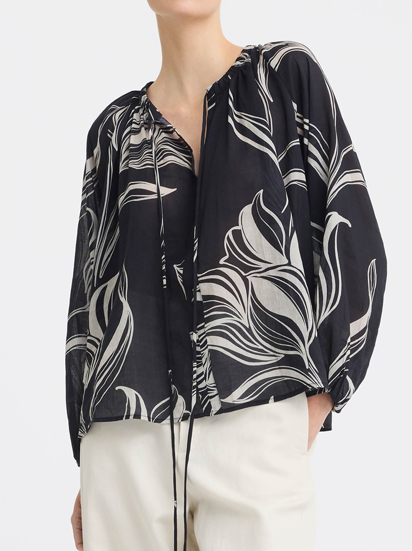 Image of a model wearing Tops. Product name - MORRISON CANDICE BLOUSE in Print colour by brand - Morrison