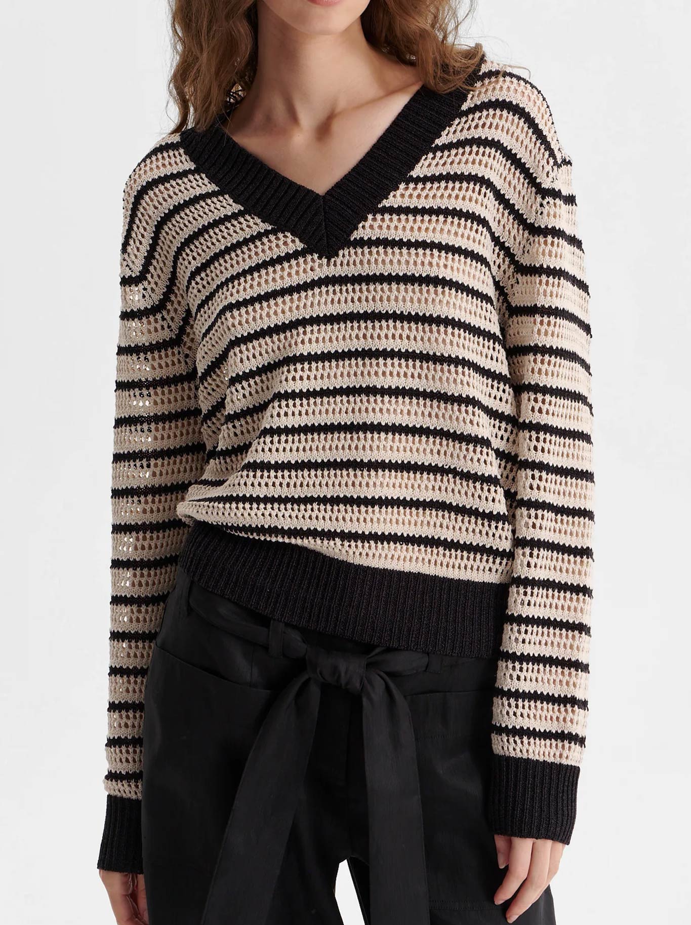 Image of a model wearing Outerwear. Productname: MORRISON CLOVER KNIT PULLOVER in Stripe colour by brand - Morrison