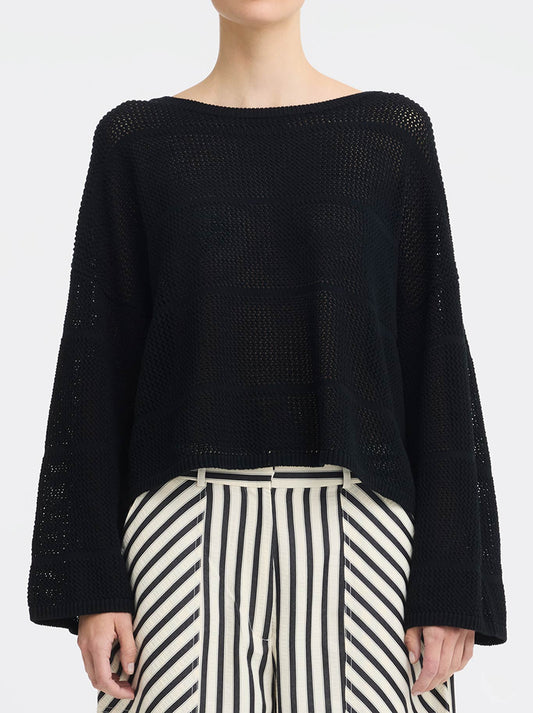 Image of a model wearing Outerwear. Product name - MORRISON ELIRA KNIT BOAT NECK in Black colour by brand - Morrison