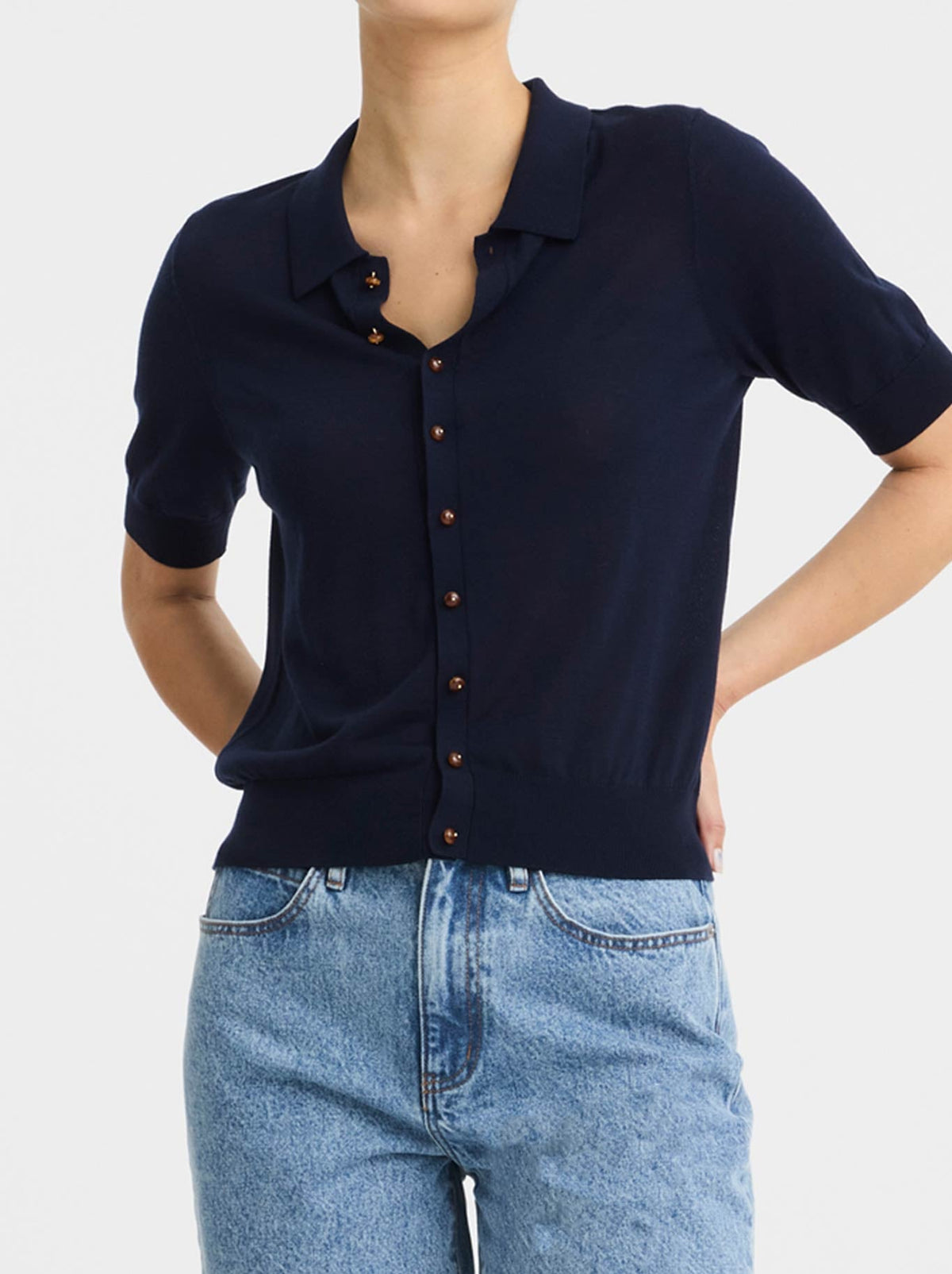 Image of a model wearing Outerwear. Product name - MORRISON MICAH KNIT CARDI in Navy colour by brand - Morrison