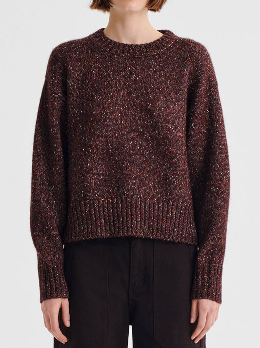 Image of a model wearing Outerwear. Product name - MORRISON ZOE KNIT PULLOVER in Boysenberry colour by brand - Morrison