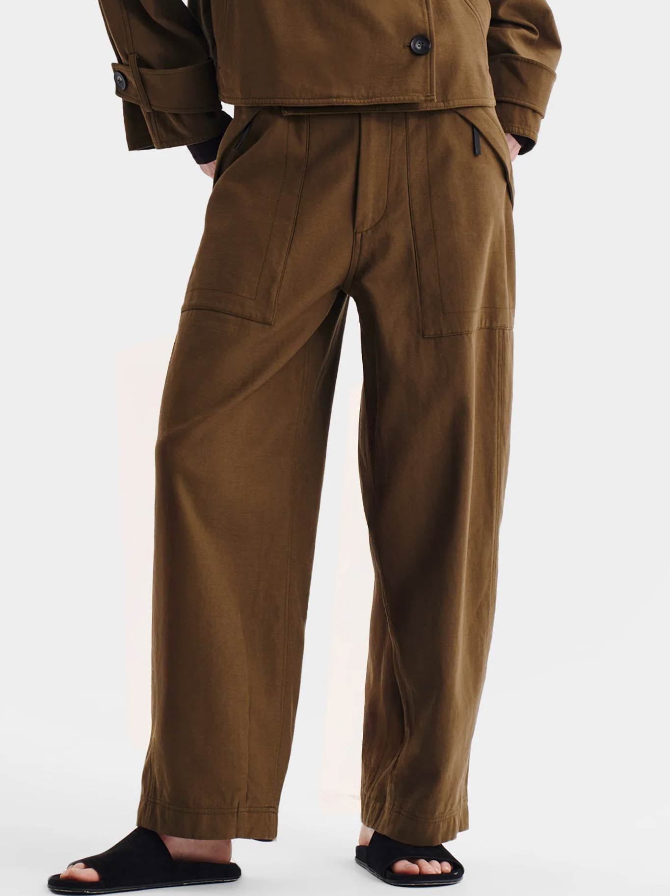 Image of a model wearing Pants. Product name - MORRISON PARKER CARGO PANT in Hunter colour by brand - Morrison