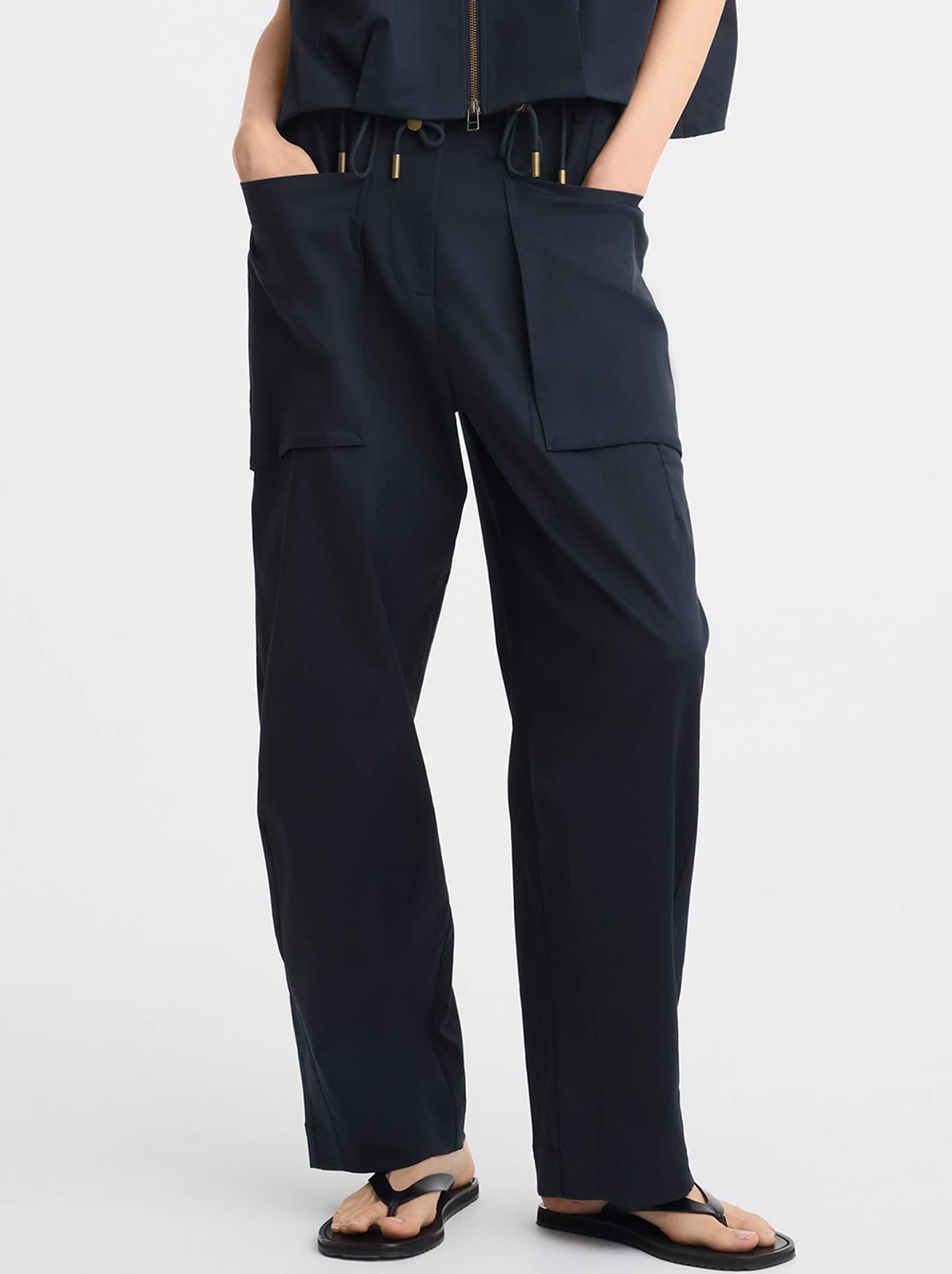 Image of a model wearing Pants. Product name - MORRISON SANDER CARGO PANT in Navy colour by brand - Morrison