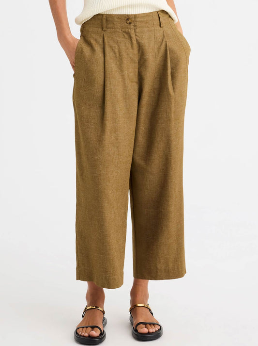 Image of a model wearing Pants. Product name - MORRISON TOMMIE PANT in Bark colour by brand - Morrison