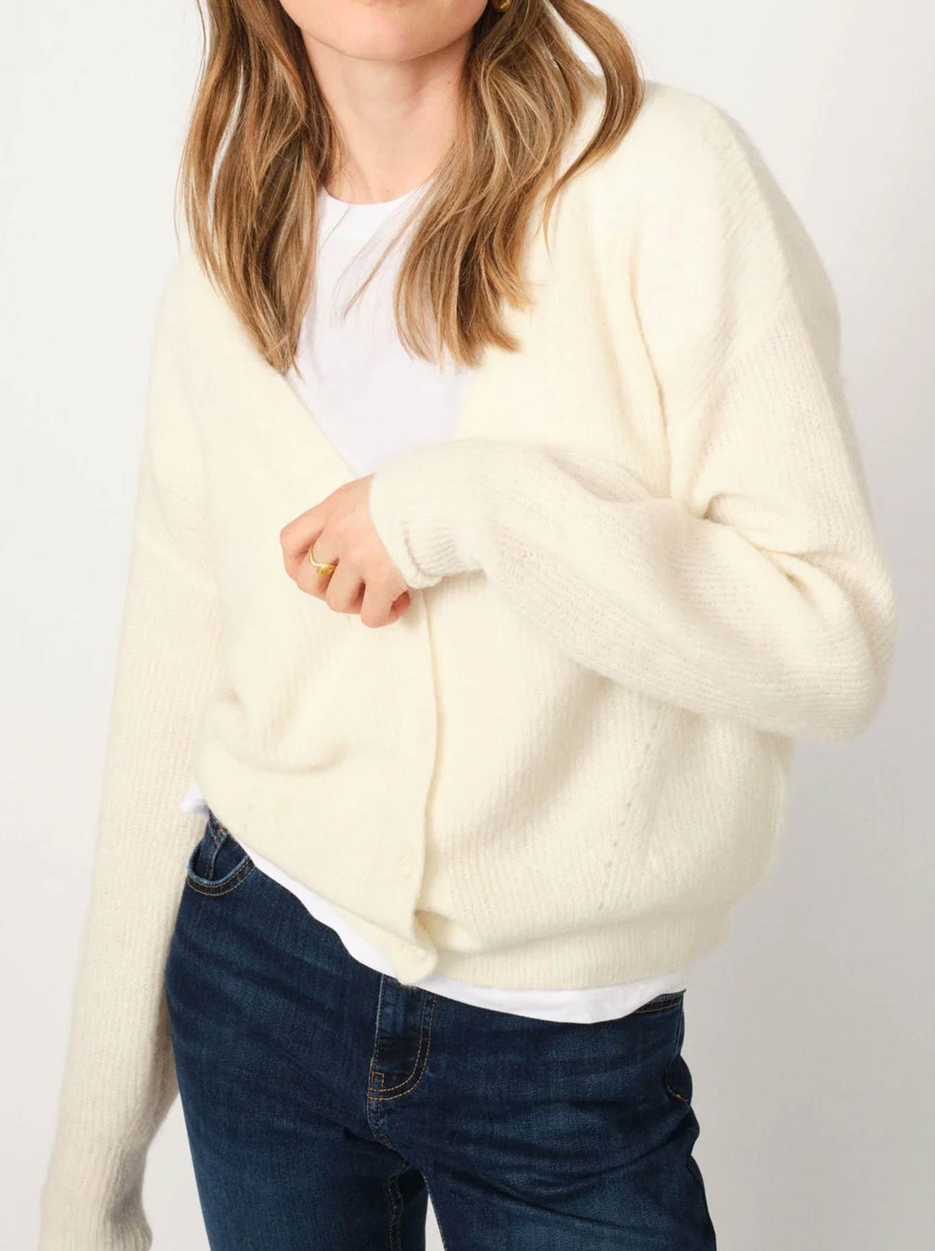 Image of a model wearing Outerwear. Productname: MOS MOSH THORA V-NECK CARDI in Ecru colour by brand - Mos Mosh